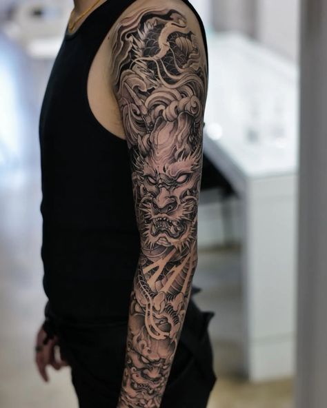 15 Breathtaking Dragon Tattoo Ideas to Ink! Dragon Chino Tattoo, Dragon Tattoo Full Sleeve, Behind Ear Tattoo Small, Ink Dragon, Japanese Leg Tattoo, Koi Tattoo Sleeve, Dragon Tattoo Arm, Dragon Tattoo Sketch, Luck Tattoo