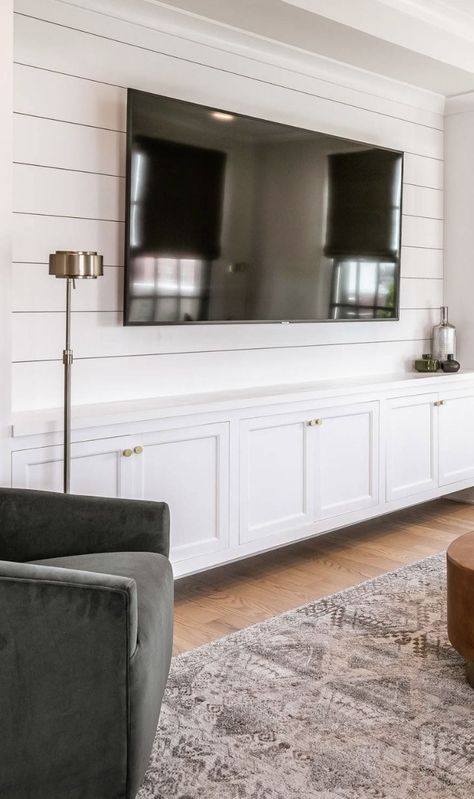 Low Built Ins Under Tv, Built In Tv Console Ideas Living Rooms, 85 Inch Tv Built In, Wainscoting Ideas Living Room Tv, Floating Wall Cabinets Living Room, Built In Tv Stand Living Room, Shiplap Behind Tv Living Room, Basement Tv Ideas, Tv Shiplap Wall