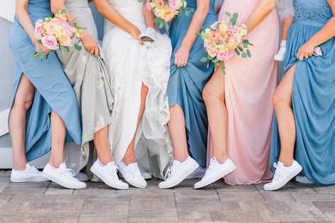 Comfort is key when celebrating your big day! Photo @lisamarshallphotography Florals @utcfflorals #bridalinspo #bridalstyle #bridestyle #bridetobe #bridallook #bridalfashion #sayyestothedress #floridabrides #brideideas #bridesrealwedding #bridalparty #bridalpartydresses #bluebridesmaiddresses #springweddingstyle #springbrides #springbridesmaidstyle #bridesmaiddresses #springbridesmaids #springweddingfashion #springbridalfashion #bridalsneakers #brideaccessories #bridalaccessories Wedding Dress Sneakers, Casual Bridal Party, After Party Wedding Dress, Party Sneakers, After Party Wedding, Dress Sneakers, Party Wedding Dress, Wedding Hairstyles Bridesmaid, Wedding After Party