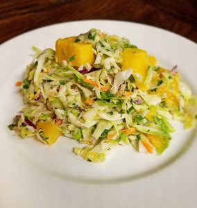 Mango Coleslaw with a Bite - The Culinary Center of Kansas City Mango Coleslaw, Cooking Light Magazine, Coleslaw Dressing, Coleslaw Mix, Coleslaw Recipe, Fruit Salad Recipes, Salad Side Dishes, Cooking Light, Yummy Sides