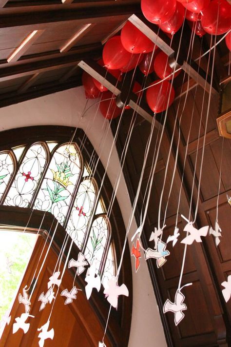 Pentecost, The Holy Spirit Descended like a Dove.  Cut out on cardstock, doves, decorated by the Sunday School, with handwritten scriptural verses by the adults, attached to helium balloons (red), symbolic of the tongues of fire that were on each of the believers.  These are waiting in the narthex entryway on Pentecost Sunday, and after the service, one is taken by each member, and released outside, symbolic of the releasing of the Holy Spirit in our own lives.: Pentecost Decorations, Pentecost Craft, Tongues Of Fire, Fire Theme, Pentecost Sunday, Church Banner, Prayer Stations, Altar Design, Church Altar