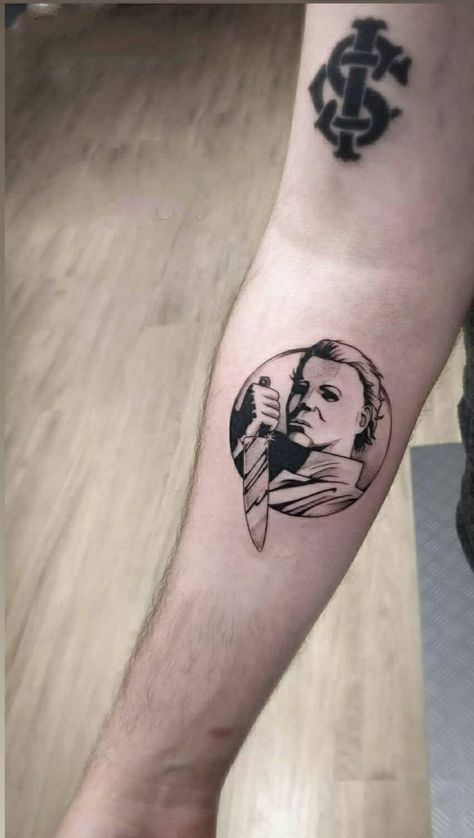 50+ stunning Michael Myers tattoo ideas that will make your blood run cold: meanings, cost estimation, and the best tattoo artists are gathered in our article. Michael Myers Tattoo Ideas, Micheal Myers Tattoo, Michael Myers Tattoo, Myers Tattoo, Clothes Game, E.t Tattoo, Tattoo Halloween, Horror Tattoos, Horror Movie Tattoos