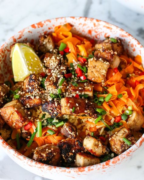 Sticky Tofu Carrot Fried Rice<p>This sticky tofu carrot fried rice is delicious! Loaded with protein and veggies, this quick and colorful dish is supercharged with flavor. You can use any veggies you’ve got to hand, and it will always taste amazing with the sweet, sticky tofu and zingy fresh ginger and lime.</p> Carrot Fried, Sticky Tofu, Gluten Free Drinks, Creamy Rice Pudding, Carrot Fries, Creamy Rice, Colorful Dishes, Meat Substitutes, Carrot Recipes