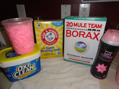 This is my own version of liquid laundry detergent, it smells AMAZING! Cleans great too! Cheap and easy to make! melt 1/2 cup zote bar soap shredded in pot with 2 cups water, once soap is melted lower temp and add 1 cup each of borax, washing soda oxyclean and any scent booster you like, mix well until completely disolved. Pour into 5 gallon bucket and mix with 1 gallon of HOT water, then gradually add in 1 gallon cooler water. Let sit for 5-10 minutes before use. 1 cup per load. Easy! Uses For Borax, Borax Uses, Fels Naptha, Laundry Booster, Powder Laundry Detergent, Laundry Powder, Homemade Laundry Detergent, Homemade Laundry, Natural Laundry