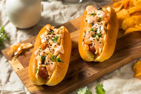 30 awesome but easy hot dog toppings you need in your life | lovefood.com Kimchi Hot Dog, Easy Romantic Dinner, Kimchi Slaw, Chili Dog Chili Recipe, Hot Dog Recipe, Breakfast Cocktails, Gourmet Hot Dogs, Hot Dog Toppings, Chili Dogs