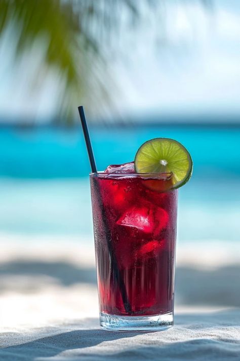 Try this Lime Infused Hibiscus Tea for a refreshing twist to your beverage repertoire. The perfect balance of tart and sweet, hibiscus tea is known for its vibrant color and health benefits. By adding a hint of lime, you can enhance its taste further and create a perfect drink for hot summer days or any gathering. Learn how to brew this fragrant tea using dried hibiscus flowers and lime juice to create a refreshing drink that is sure to impress your friends and family. Enjoy the therapeutic properties and delicious flavor in every sip. Sweet Hibiscus Tea, Hibiscus Tea Recipe, Lime Tea, Dried Hibiscus Flowers, Berry Tart, Citrus Twist, Shrimp Cocktail, Hibiscus Tea, Tea Recipe