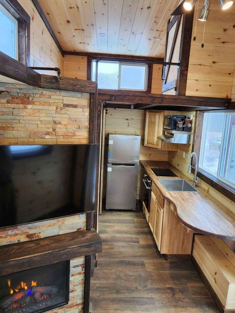 While you may not enjoy the spaciousness in this tiny towable home, but you certainly will enjoy the airy feel and ambiance of one! Above The Fridge, Creative Retreat, Loft Stairs, Rich Home, Queen Mattress Size, Simple Aesthetic, Small Cabinet, Small Shelves, Tiny Home