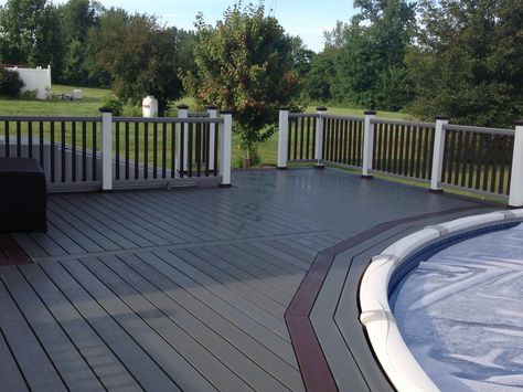 Tricolored Trex deck with accent around pool. Trex Deck Around Above Ground Pool, Deck Siding Ideas, Deck Around Above Ground Pool, Pool Decking Ideas, Poolside Ideas, Riverside Pool, Pool Surround, Decks Around Pools, Pool Decking