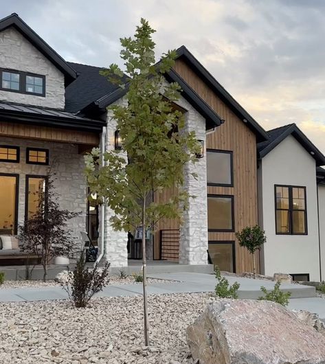 Modern Farmhouse Garage Exterior, Gray Black White House Exterior, House Vinyl Siding Ideas Exterior, Home Exterior Black Windows, Black White House Exterior, Timeless Exterior House Colors, Black House Exterior Modern, Organic Modern Exterior, Exterior Wood Paneling