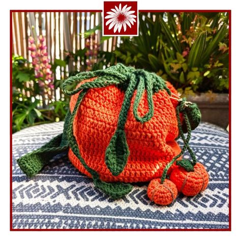 🎃 It's never too early for pumpkins! This is our last Tutti Frutti bag for now. This crochet pumpkin handbag is fully lined with a drawstring closure and features two adorable dangling pumpkins. 🎃 Available soon! #HandmadeBag #crochetersofinstagram #crochetbags #smallbusiness #ArtisanBag Artisan Bag, Crochet Pumpkin, Tutti Frutti, Handmade Bags, Crochet Bag, Pumpkins, Daisy, This Is Us, Handbags