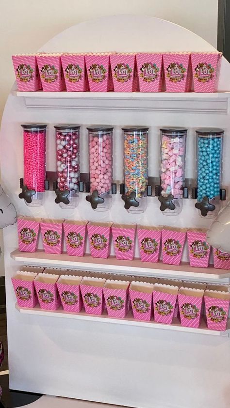 A pink LOL doll themed candy bar at a children's birthday.  Birthday party inspiration for a little girl Doll Themed Birthday Party, Diy Party Props, Party Rental Ideas, Party Rentals Business, Barbie Theme Party, Candy Stand, Lol Doll, 4th Birthday Party, Candy Display