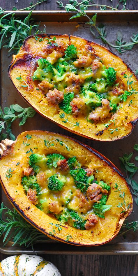 Stuffed Spaghetti Squash with Broccoli, Spicy Italian Sausage, and Cheddar Cheese - on a baking sheet. Broccoli Sausage, Stuffed Spaghetti Squash, Spicy Italian Sausage, Courge Spaghetti, Spaghetti Squash Recipes, Autumn Inspired, Fall Dinner, Squash Recipes, Spaghetti Squash