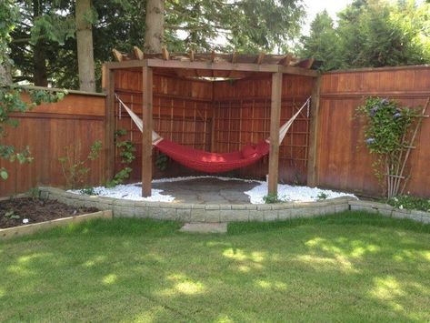 I'm thinking a structure like this could be built right in line with your fence posts, so that the two would blend together. Corner Hammock, Pergola Decor, Corner Gazebo, Freestanding Pergola, Pergola Deck, Corner Pergola, Pergola Diy, Pergola Carport, Backyard Hammock