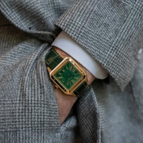 Cartier’s latest custom order was created for @lifeofyoni : a Cartier Santos Dumont XL featuring a malachite stone dial, a green leather strap, and a gold case and buckle. The watch’s most distinctive feature is its numerals, which include Roman, Hindi, Arabic, Runic, Chinese, Hebrew, and Greek characters. The philosophy behind this piece is that, despite differences in colour, creed, or religious beliefs, watches can serve as symbols of unity. In a time of so much conflict and division, th... Cartier Santos Dumont, Cartier Santos, Malachite Stone, Men Fashion Casual Outfits, Gold Case, Green Leather, Men Fashion, Cartier, Division