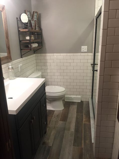 Remodel: Modern Rustic bathroom with white subway tile and "reclaimed wood" ceramic tile floor: Small Farmhouse Bathroom, Makeover Kamar Mandi, Basement Bathroom Design, Wood Tile Bathroom, Farmhouse Bathroom Remodel, Casa Vintage, Basement Bathroom, Upstairs Bathrooms, Apartment Bathroom