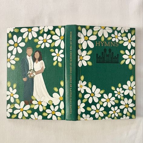 I painted this hymn book for one of my best friends’ wedding! Swipe to the end to see the reference photo 💛 #paintedhymnbook #ldshymns #paintedscriptures #paintedbookofmormon #ldsart #hymnbook Painting Book Covers Ideas, Book Of Mormon Art, Lds Hymns, Cute Art Drawings, Lds Crafts, Book Of Mormon Scriptures, Mormon Art, Church Humor, Lds Art