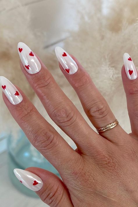 Romantic Chic: Chrome white stiletto nails adorned with dainty red hearts add a touch of love to any look. // Photo Credit: Instagram @karin.nailedit Red Chrome Nails, Star Nail Designs, Lit Af, Heart Nail Designs, Chrome Nails Designs, Pink Ombre Nails, Different Nail Designs, Pearl Nails, Heart Nails