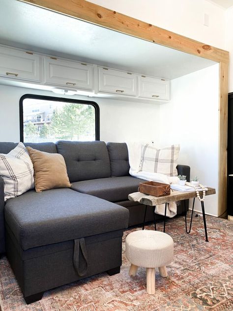 This refurbished camper features an all-new luxury kitchen perfect for cooking! | RV Inspiration Couches With Storage Underneath, Sleeper Sofa For Camper, Camper Slide Out Remodel, Rv Slide Out Remodel, Refurbished Camper, Best Couch, Renovated Rv, Rv Living Room, Pull Out Sleeper Sofa