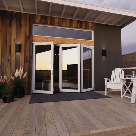 Reimagine your indoor-outdoor spaces with the F-4500 2-Panel folding fiberglass patio door. These contemporary folding patio doors are designed to fit in any standard sized patio door opening, making this upgrade a great solution for your next home project. Outfitted with more glass and a slimmer frame, these patio doors include features that go above and beyond your typical patio door offering. We’ve taken the design one step further with a contemporary lock set and a multipoint lock system for added security. JELD-WEN F-4500 108-in x 80-in x 5-5/8-in Jamb Low-e Primed Fiberglass Folding Left-Hand Folding Patio Door in White | LOWOLJW251900016 Folding Back Doors, Sliding Deck Doors, Accordion Glass Doors Indoor Outdoor, Outdoor Patio Door Ideas, Slider Doors Ideas, Sliding Door Ideas Patio, Backyard Doors Ideas Patio, Panoramic Doors Patio, Bifold Patio Doors With Screens