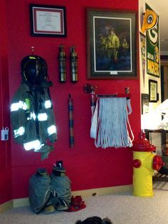 I like the idea of displaying turnout gear Fireman Room, Firefighter Bedroom, Fire Dept Decor, Firefighter Man Cave, Fire Department Decor, Firefighter Room, Firefighter Home Decor, Firefighter Decor, Retirement Ideas