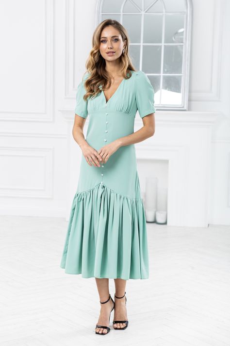 Let the Graceful Breeze carry you away in our Mint Puff-Sleeve Belted Midi Dress. The flowing fabric and charming puff sleeves offer a look of effortless movement and grace, while the delicate mint hue adds a touch of refreshing sophistication.  #eveningdress #dress #dresses #stylish #dresslover #womenwear #mididress #belteddress #mintdress #weddingdress Flowing Fabric, Mint Dress, Wear Store, Belted Midi Dress, Puff Sleeve Dresses, Crop Top Shirts, Women's Wear, Affordable Clothes, Dress Suits