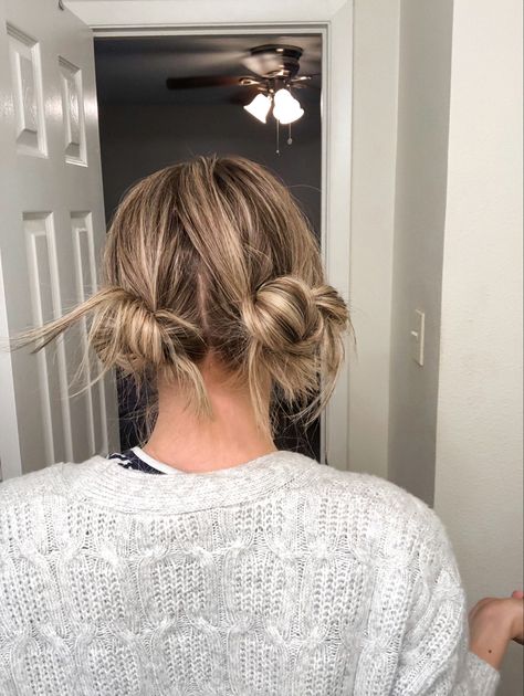 The more adult appropriate fun bun or space buns. This two low bun do is a simple hairstyle that will stay put all day long. Low Bun Pigtails Hairstyles, How To Do Messy Low Space Buns, Low Pigtail Buns Short Hair, Two Buns Outfit, Medium Simple Hairstyles, Low Messy Bun Pigtails, Two Low Buns Hairstyle Long Hair, Low Piggy Buns, Low Pigtail Bun Hairstyles