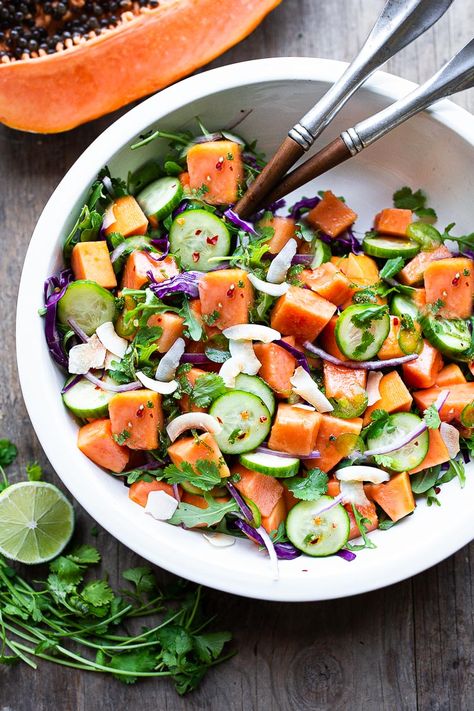 A simple Mexican Papaya Salad using ripe papaya with cucumber, red onions, jalapeño over greens with a Cilantro Lime Dressing. Easy and delicious, Vegan and Gluten-free. #papaya #papayasalad Papaya Salad Recipe, Best Vegan Salads, Papaya Recipes, Ripe Papaya, Cilantro Lime Dressing, Papaya Salad, Lime Dressing, Red Onions, Vegan Salad