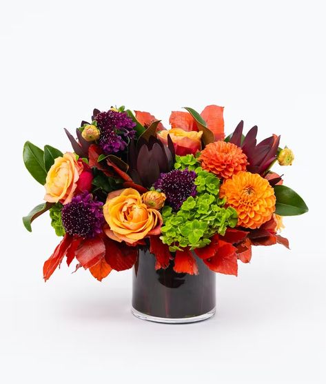 High Line Harvest - QG Floral Fall Collection Burgundy Dahlia, Backyard Birthday Parties, Friendsgiving Party, Low Centerpieces, Backyard Birthday, Thanksgiving Inspiration, Fall Floral Arrangements, Magnolia Leaves, Glass Cylinder