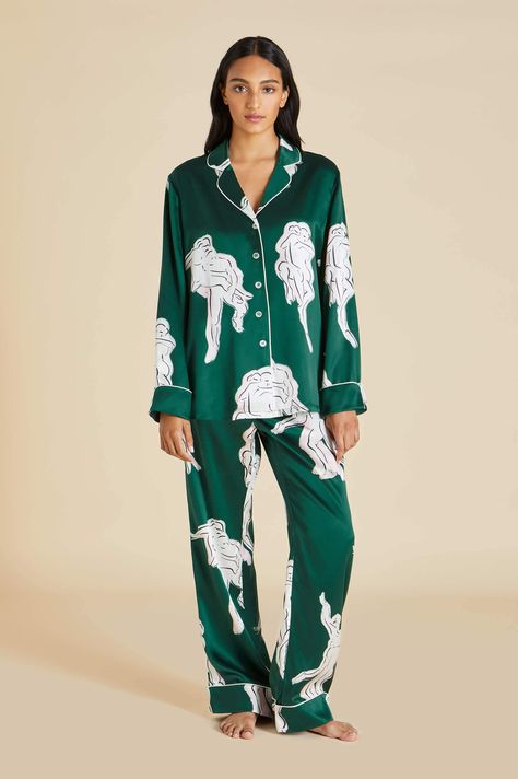 Take this waltz with us. Adorned with flowing figures inspired by the gestural portraits of Matisse, your 100% 19 momme silk canvas becomes the backdrop to a truly moving spectacle. Dance the night away, every night, in your Lila Waltz silk pyjama set. Product Details Luxury Evergreen lovers printed silk pyjama set Screen printed with a print designed in our London studio, exclusively for Resort 2022 Ivory, Jet Black & Blush accents Ivory piped silk trims Shirt: traditional notched collar, l Silk Pyjama Set, Delicate Lingerie, Luxury Pajamas, Olivia Von Halle, Luxury Loungewear, Black Blush, Camisole Set, Silk Pajama Set, Slip Dresses