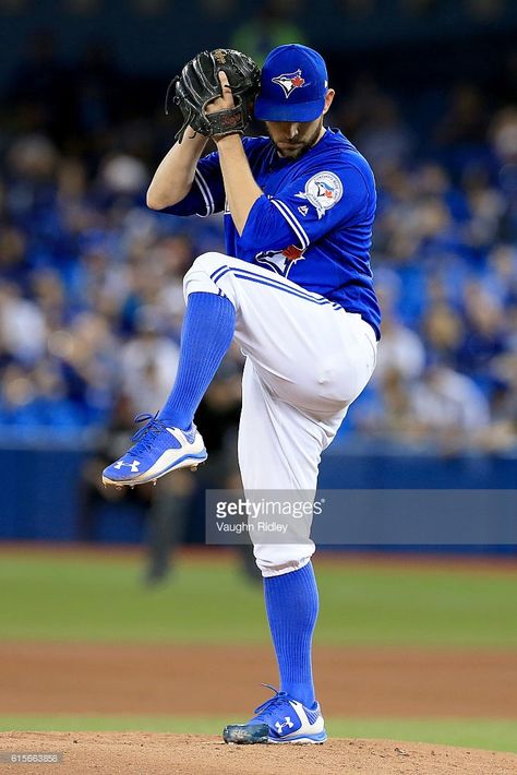 Marco Estrada #25 of the Toronto Blue Jays throws a pitch in the first inning against the Cleveland Indians during game five of the American League Championship Series at Rogers Centre on October 19, 2016 in Toronto, Canada. Baseball Throw Pose, Baseball Throw, Dark Hero, Blue Jay Way, Toronto Blue Jays Baseball, Hot Rugby Players, Rogers Centre, Blue Jays Baseball, Cleveland Indians Baseball