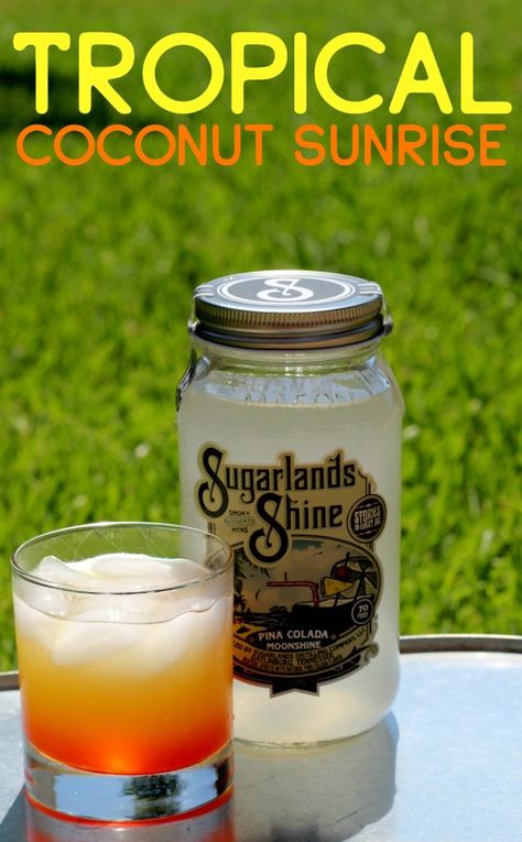 Tropical Coconut Sunrise Made with Sugarlands Shine Moonshine #ad #drink SugarlandsSummer Sugarlands Moonshine Recipes, Pina Colada Moonshine Recipe, Moonshine Mixed Drinks, Moonshine Cocktails Recipes, Moonshine Drinks, Moonshine Drink Recipes, Spiked Drinks, Alcoholic Recipes, Coconut Rum Drinks