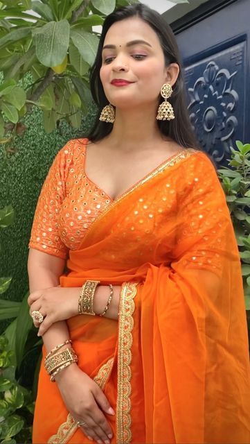 wardrobe luxury by Shreya on Instagram: "Designer soft organza orange saree with embroidered cutwork border and mirror work blouse piece. Price-2289(free shipping) To buy wtsapp 8851109873 /dm or visit https://wlbyshreya.com/ Follow our page for more trending saree reels Festive saree/festive wear #saree #sarees #trendingreels #viralvideos #fashionblogger #orangesaree #sareelove #sareesusa" Diwali Organza Blouse With Mirror Work, Saree Blouse Piece With Mirror Work On Organza, Evening Organza Saree With Mirror Work, Orange Saree With Mirror Work, Semi-stitched Orange Saree With Mirror Work, Farewell Sarees, Mirror Work Blouse, Orange Saree, Net Saree