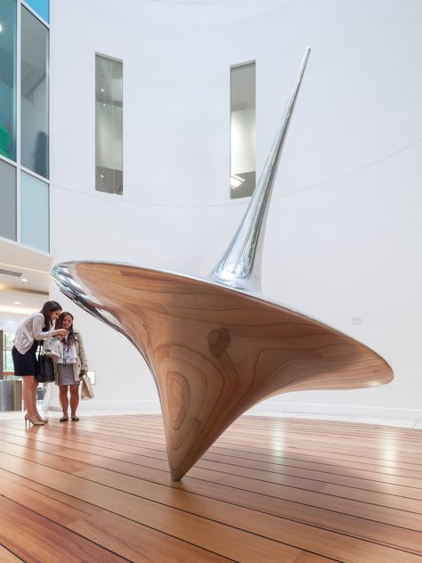 Spin, 2015 - Spin is a site-specific sculpture in the form of a spinning top at the iconic Ark Building in Hammersmith. The building sits on ancient Neolithic settlements that would have occupied this area of London. The spinning top is one of the oldest recognisable toys found on the site so was the perfect inspiration for the sculpture. Installation Art Ideas, Spin Art, Public Sculpture, Artistic Installation, Spinning Top, Art Simple, Big Art, Grid Design, Art Installation