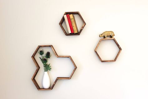 Make awesome mid century modern honeycomb shelves for less than $10 using popsicle sticks! These West Elm worthy hexagon shelves add warmth and dimension to any gallery wall and also look great on their own. Click for instructions and free downloadable template. | MakeAndDoCrew.com Mid Century Diy, Button Wall Art, Diy Honeycomb, Make And Do Crew, Honeycomb Shelves, Honey Diy, Hexagon Shelves, Rustic Crafts, Diy Craft Tutorials