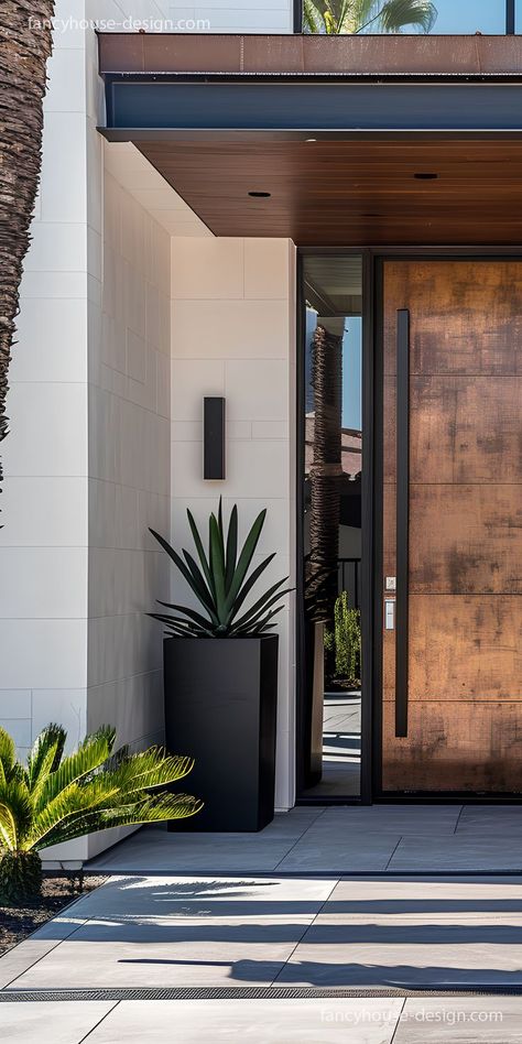 The modern house entrance combines a rich wood finish with glass panels, bringing warmth to an urban exterior. Modern House Entrance, Pathway Design, House Front Door Design, Contemporary Houses, Doors Design, Vintage Scissors, Modern Hardware, Entrance Door Design, The Modern House