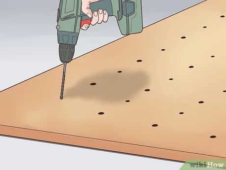 How to Build a Climbing Wall (with Pictures) - wikiHow Toddler Climbing Wall, Wall With Pictures, Kids Rock Climbing, Diy Climbing Wall, Climbing Wall Kids, Home Climbing Wall, Indoor Climbing Wall, Indoor Playroom, Bouldering Wall