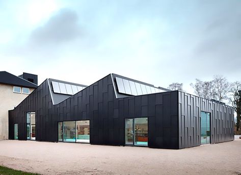 Primus Arkitekter upgrades an old factory into a chic solar-powered library and community center | Inhabitat - Green Design, Innovation, Architecture, Green Building Sawtooth Roof, Industrial Facade, Factory Architecture, Roof Shapes, Cladding Systems, Roof Architecture, Industrial Architecture, Cultural Centre, Roof Styles