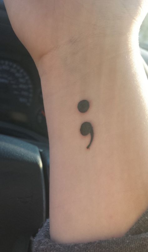 A simple semicolon tattoo will really do. It doesn’t need to have much design to look beautiful because it’s message already is. Comma Tattoo Meaning, Comma Tattoo, Igy6 Tattoo, Semi-colon Tattoo On Ankle, Comma Tattoo Semicolon, Colon Tattoos, Unique Semi-colon Tattoo Ideas Hidden, Discrete Semi-colon Tattoo Ideas, Semi-colon Tattoo Im Still Here