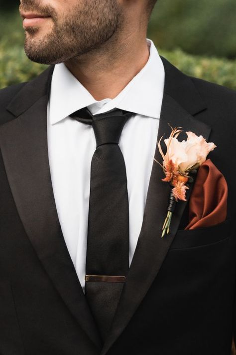 Black Tux With Terracotta, Black Suit Rust Tie Wedding, Black Tux With Copper Tie, Black Suit With Copper Tie, Black And Orange Tuxedo, Fall Groom Tuxedo, Black Suit With Burnt Orange Tie, Black Suit Terracotta Wedding, Black And Terracotta Groomsmen