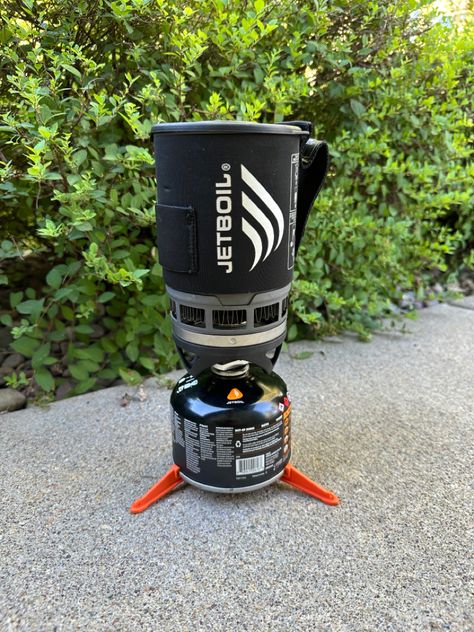 Jetboil Zip Camping Stove Cooking System in Carbon – A compact and efficient outdoor cooking solution. Camp Stove Cooking, Brew Coffee, Camping Stove, Hot Meals, The Trail, Outdoor Cooking, Coffee Brewing, Camping Gear, Stove