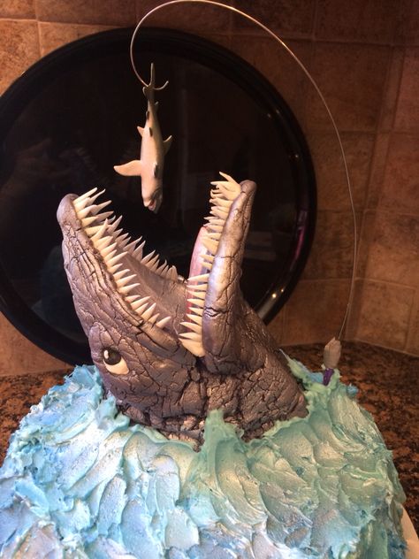 The Jurassic World inspired birthday cake I made for my son's 12th birthday. It was a big hit with him and his friends. Mosasaurus Cake, Jurassic Party Ideas, Jurassic World Cake, Dinosaur Cakes, Festa Jurassic Park, Jurassic Park Party, Pig Birthday Cakes, Dino Cake, Dinosaur Birthday Cakes