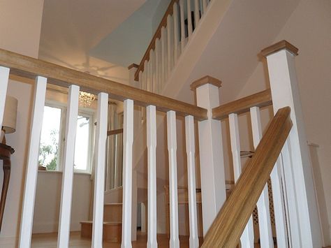 A softwood winder staircase for a loft conversion, painted white with feature oak handrail and newel caps. White And Oak Staircase, Oak And White Staircase, Stairs Banister Ideas, Bannister Ideas, Stair Bannister, Staircase Banister Ideas, Winder Staircase, Banister Ideas, Oak Banister