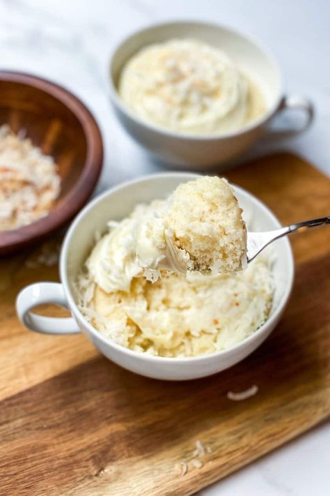 Coconut Mug Cake is a decadently delicious 2 minute microwave dessert that's perfect for coconut cake lovers. It's a simple moist and tender mug cake you'll fall in love with. Coconut Mug Cake Microwave, Mug Cobbler Microwave, Mug Cake Coconut Flour, Mug Cake Coconut, Keto Mug Cake Microwave, Vanilla Mug Cake No Egg, Coconut Mug Cake, Banana Mug Cake No Egg, Mug Cake Microwave Easy 3 Ingredients No Egg