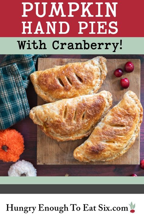 Two delicious holiday flavors together: Pumpkin Cranberry Hand Pies. Flaky, all-butter pie crust holds spiced pumpkin filling and cranberry. At HungryEnoughToEatSix.com. Pumpkin Hand Pies, Thanksgiving Desserts Pie, Holiday Flavors, Thanksgiving Desserts Table, All Butter Pie Crust, Pumpkin Filling, Pumpkin Cranberry, Hand Pie, Thanksgiving Pies