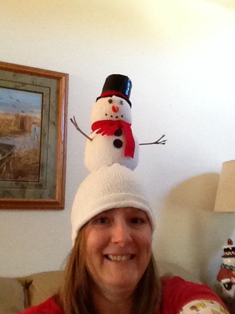 Our family does a crazy hat exchNge every year and it becomes a challenge to come up with new ideas. This is my Snowman hat made from sweatshirt sleeve turned inside out. A little top heavy bit cute. Diy Christmas Hat Funny, Crazy Christmas Hat Ideas, Crazy Christmas Hat Diy, Ugly Christmas Hat Ideas, Funny Christmas Hats Diy, Christmas Hats Ideas Diy, Christmas Hats Diy, Crazy Christmas Hat, Christmas Hats Ideas