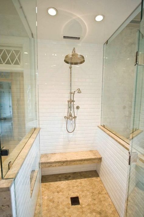 a smll shower space with white tiles, a floating earthy bench and a matching floor plus glass walls on two sides - DigsDigs Floating Shower Bench, White Beveled Subway Tile, White Marble Shower, Gray Shower Tile, Marble Shower Tile, Shower Recess, Subway Tile Showers, Window In Shower, Marble Showers