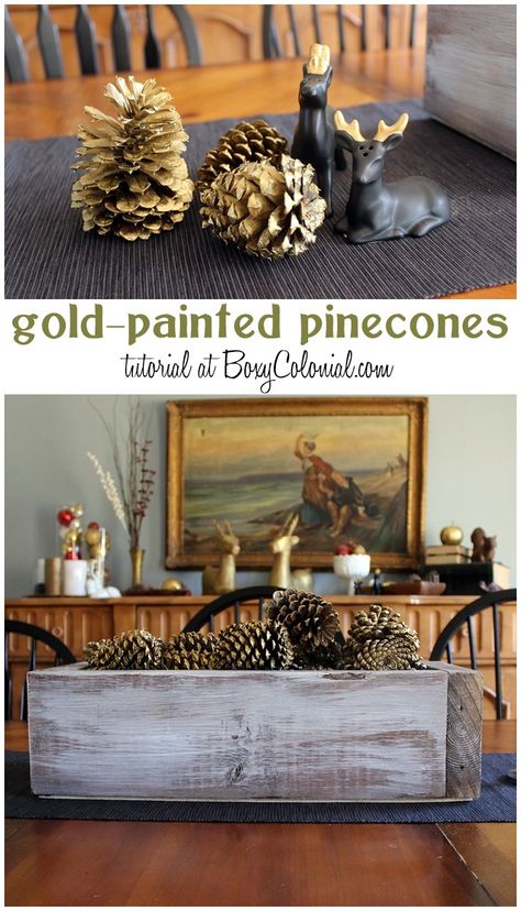 Gold spray painted pine cones Gold Pinecones Centerpiece, Thanksgiving Table Centerpiece Ideas, Rustic Wooden Box Centerpiece, Painted Pine Cones, Christmas Centerpiece Ideas, Table Centerpiece Ideas, Wooden Box Centerpiece, Rustic Halloween Decor, Box Centerpiece