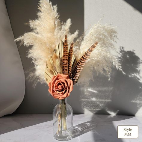 Dried Flower Pampas Grass Centerpiece options are carried in sets of 12, 6, and 4 as well as individual centerpieces. We also carry the flower arrangement without the vase to beautifully decorate your favorite vase or serve as Bridesmaids Bouquets. Our centerpieces are perfect for wedding decor, hair salons, engagement dinners, birthday parties, table decor, home decor, or special events. Please select the option you prefer from the dropdown menu in listing. Our pampas grass centerpieces are Sustainable and Eco-Friendly Decor that require no special care and are lightweight perfect to travel with to simplify your destination Wedding or Event. If your event is in a couple of months or next year, these centerpieces can be safely kept in their shipping box until the event. Take advantage of o Pampas Grass Centerpiece Wedding Ideas, Terracota Flower, Pampas Grass Centerpiece, Grass Centerpieces, Wiccan Wallpaper, Grass Centerpiece, Sweetheart Table Decor, Table Decor Wedding, Engagement Dinner