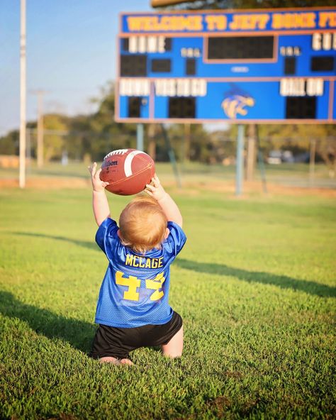 Football Themed First Birthday Pictures, Football Birthday Pictures, First Down Football Birthday Photoshoot, 1st Birthday Football Theme Photoshoot, Football Birthday Photoshoot, Football Theme 1st Birthday Pictures, Football Cake Smash Photography, One Year Old Football Photoshoot, 1st Year Down Football Birthday Photoshoot