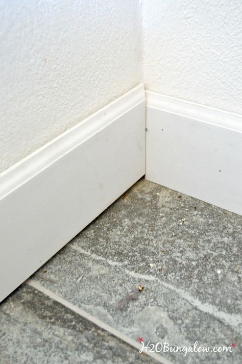 how to install baseboards on uneven floors H2OBungalow Diy Baseboards, How To Install Baseboards, Baseboard Styles, Wall Mounted Tv Cabinet, Baseboard Trim, Baseboard Molding, Floor Molding, Floor Trim, Door Casing